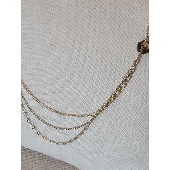 Long Gold-Toned Multi-Strand Layered Necklace with Sparkling Accents – 36" - Picture 4 of 7